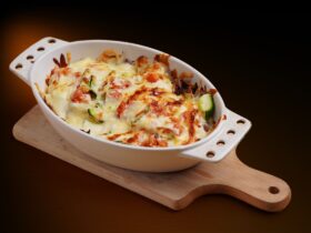 Скільки запікати кабачки в духовці: кружечками і човники